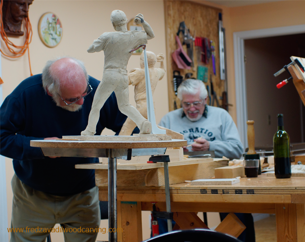 Carving and enjoying a glass of wine, wood carving classes with Fred Zavadil