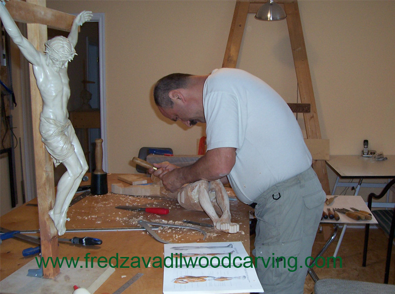 Fred carving a custom crucifix
