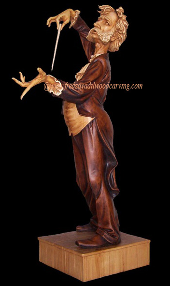 Caricature carving of opera conductor - Maestro, wood carving by Fred Zavadil