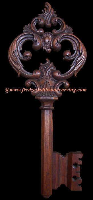 Carved door key, Honduras Mahogany,relief carving Fred Zavadil Woodcarving