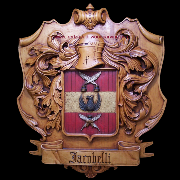 Family crest. Coat of arms. Carved, painted and stained, wood carving, basswood
