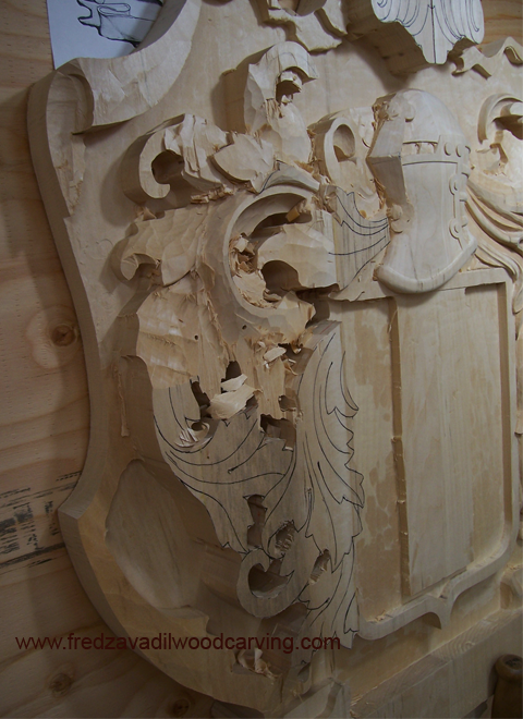 family crest, basswood carving