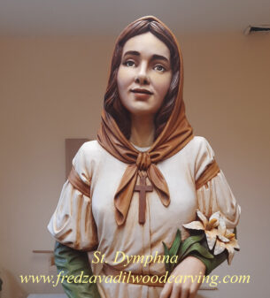 Caved sculpture of St. Dymphna, carved by Fred Zavadil from basswood